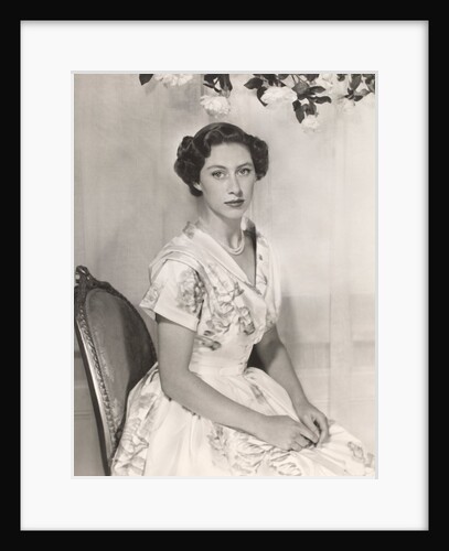Princess Margaret sitting on a chair by Cecil Beaton