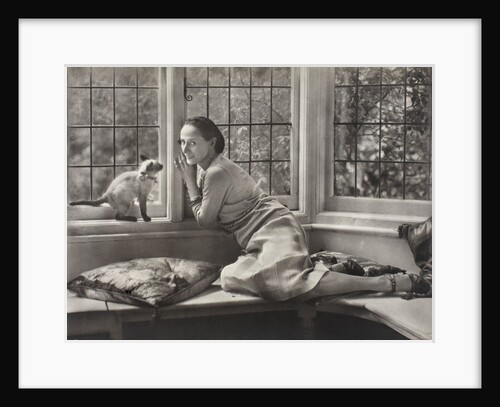 Anna Pavlova in bay window of her dining room at Ivy House by Lafayette Portrait Studios