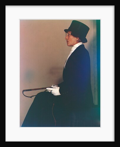 Woman in top hat sitting by Curtis Moffat
