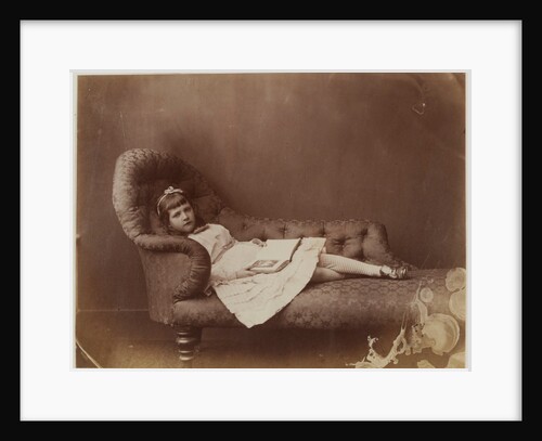 Xie Kitchin on sofa by Charles Lutwidge Dodgson