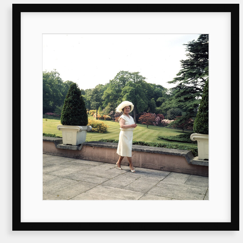 Queen Elizabeth, The Queen Mother in the gardens at Windsor Great Park by Cecil Beaton