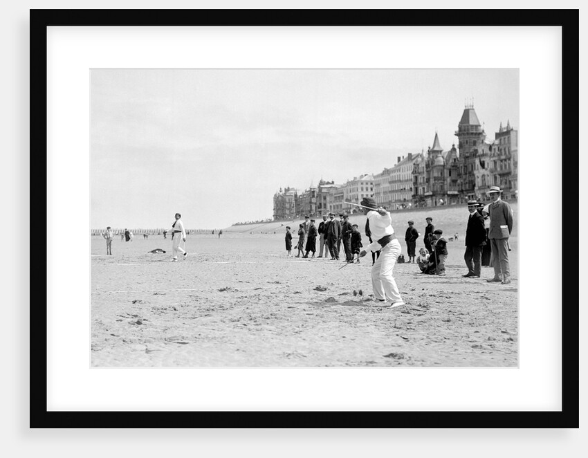 Two Men Throwing Diabolo on Sands by Andrew Pitcairn-Knowles