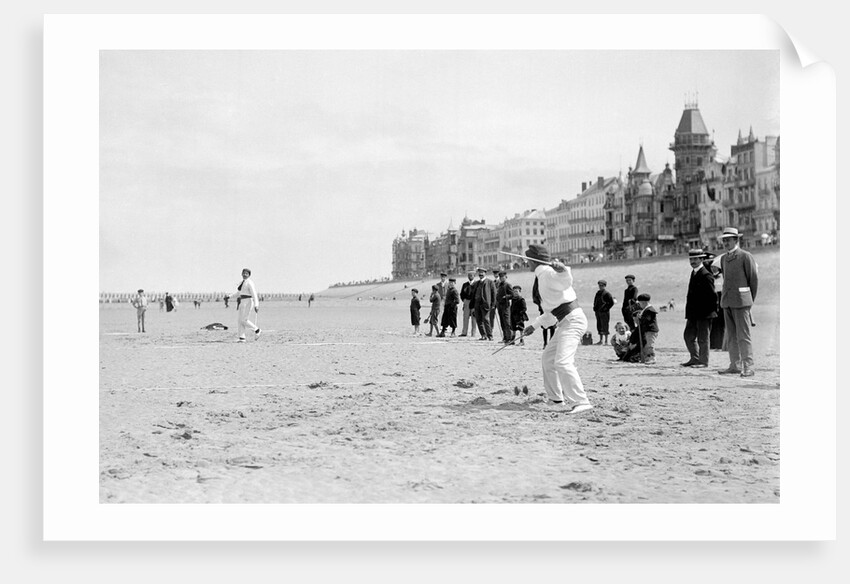 Two Men Throwing Diabolo on Sands by Andrew Pitcairn-Knowles