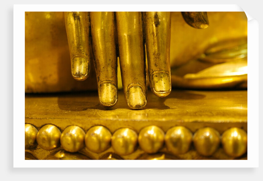 Hand of a seated Buddha by Stuart Cox