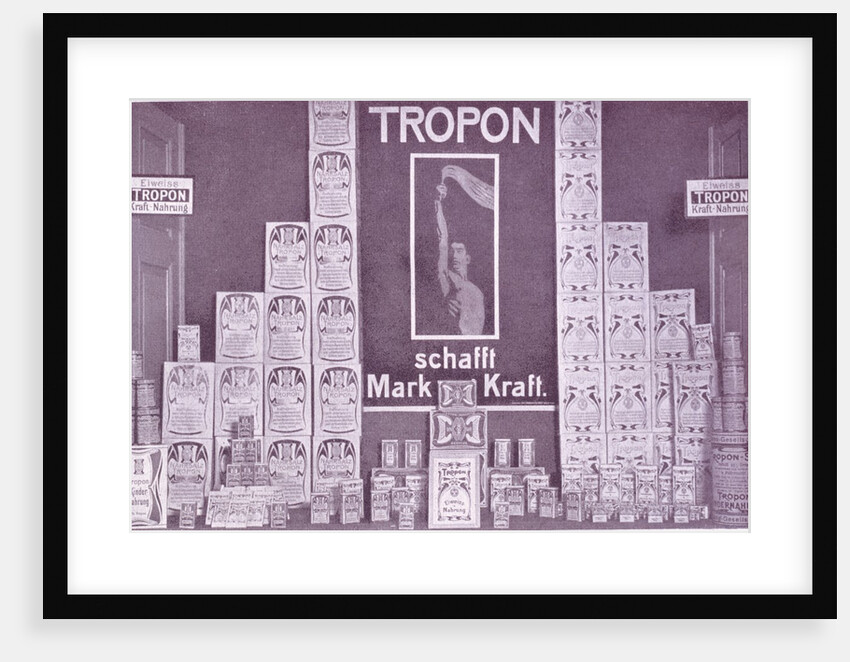 Photograph of a shop window with a display of Tropon goods by Anonymous