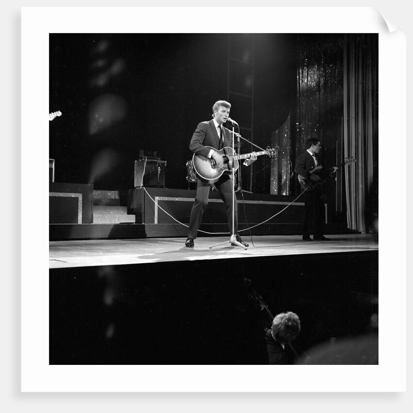 Johnny Hallyday with band performing on the Palladium Stage by Harry Hammond