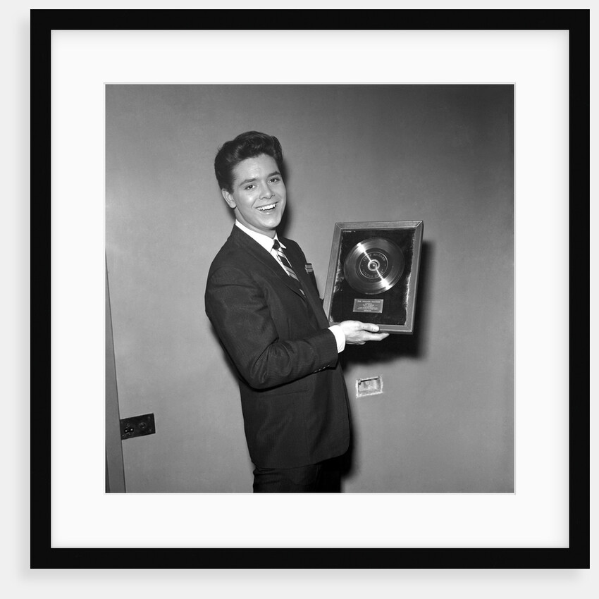 Cliff Richard with his first gold record by Harry Hammond