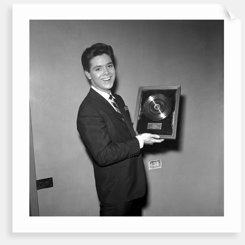 Cliff Richard with his first gold record by Harry Hammond