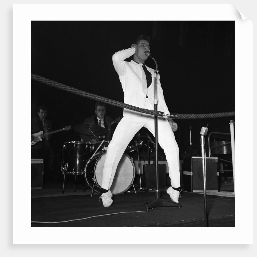 Cliff Richard performing on stage by Harry Hammond