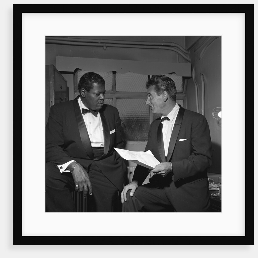 Oscar Peterson with an unknown man by Harry Hammond