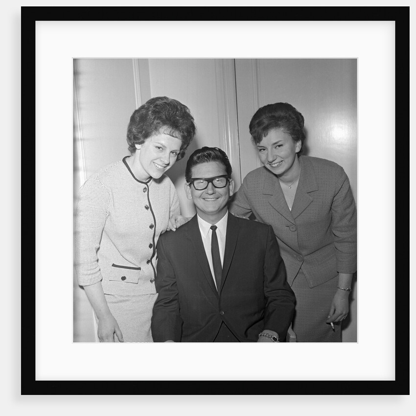 Roy Orbison posing with two fans by Harry Hammond