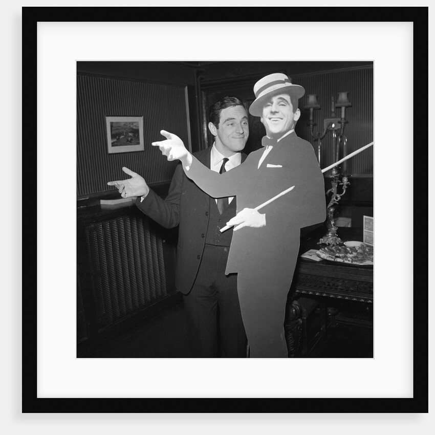 Anthony Newley with cardboard cut-out of himself by Harry Hammond