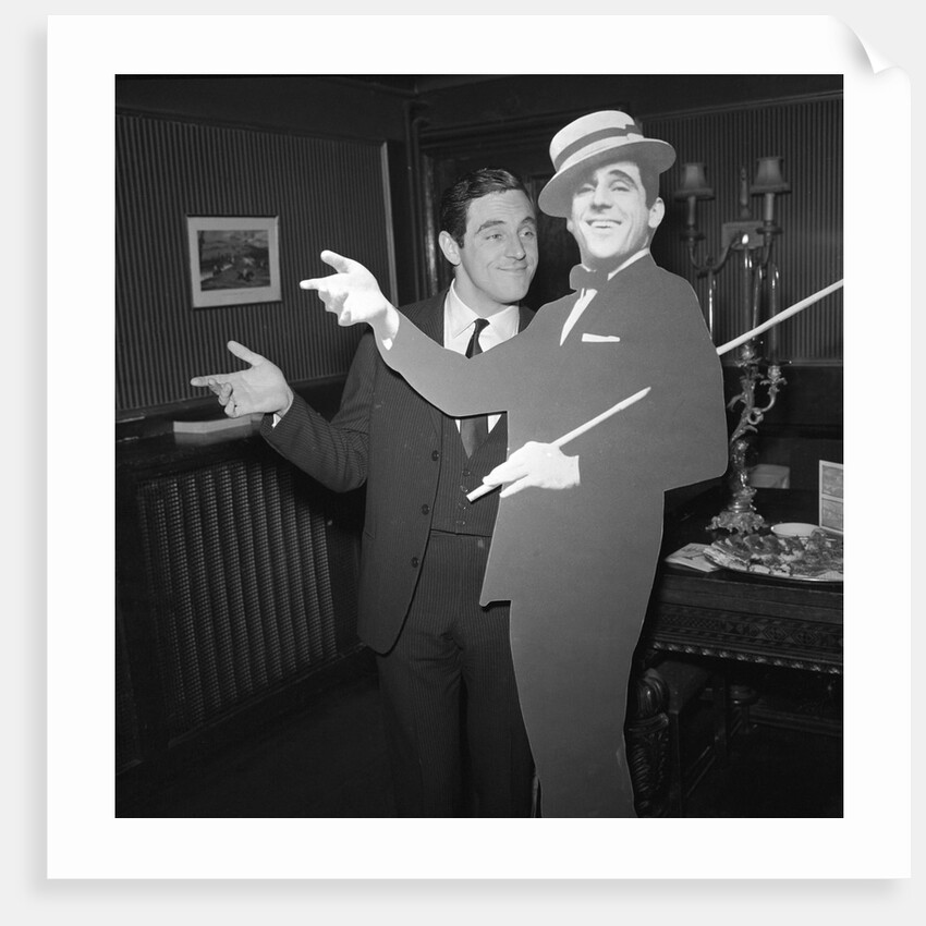 Anthony Newley with cardboard cut-out of himself by Harry Hammond