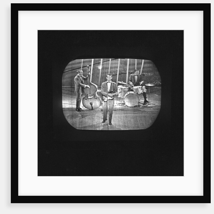 Buddy Holly on the Sunday Night at the Palladium TV show by Harry Hammond