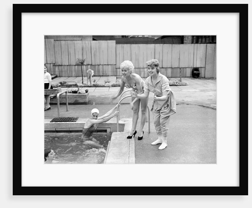 Shani Wallis with Vera Day in a swimming pool by Harry Hammond