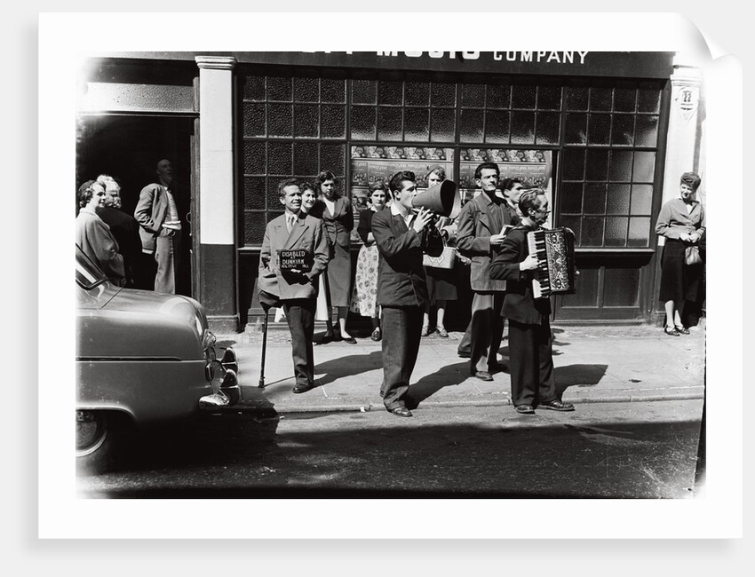 Danny Purches with a group of people by Harry Hammond