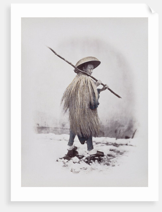 A workman in rain dress by Felice Beato