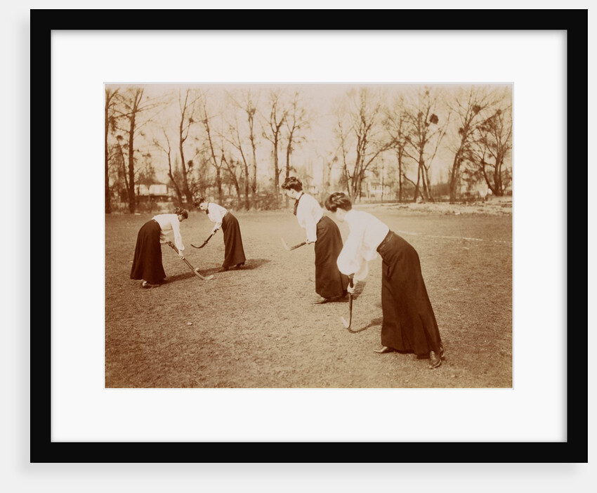 Four ladies playing hockey by Andrew Pitcairn-Knowles