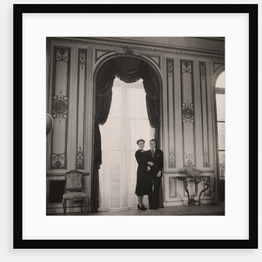 The Duke and Duchess of Windsor posing against a large window by Cecil Beaton