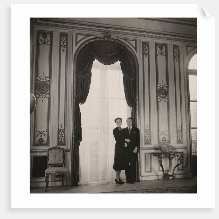 The Duke and Duchess of Windsor posing against a large window by Cecil Beaton