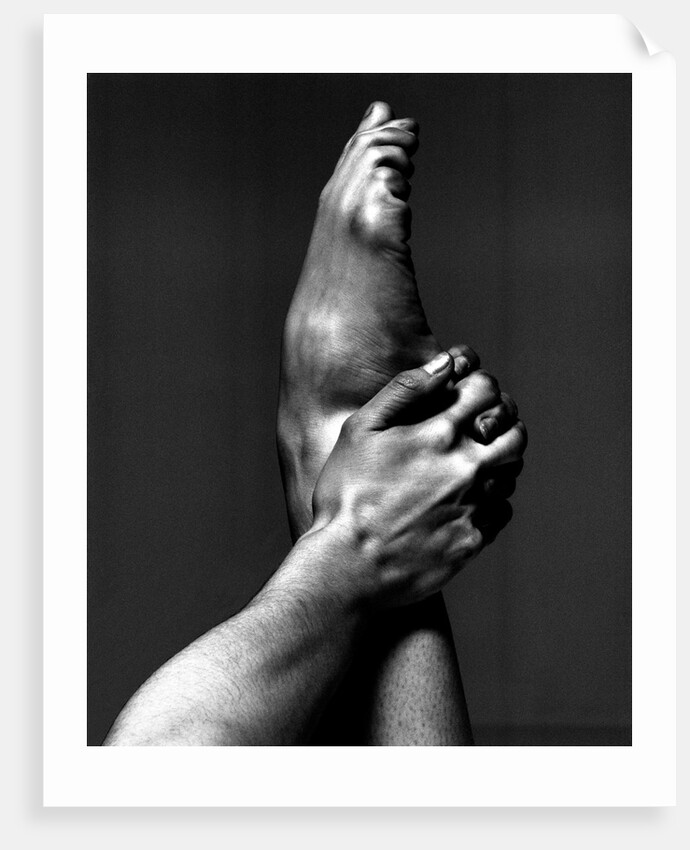 London Contemporary Dance School student's hand holding a foot by Anthony Crickmay