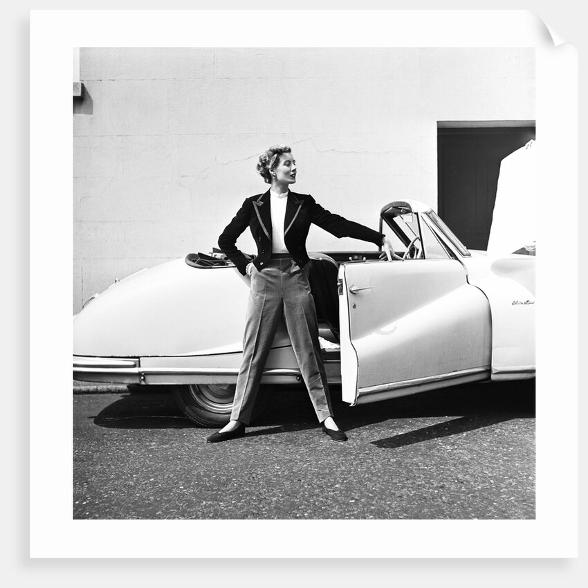 Model beside open door of Austin of England A90 Atlantic Sports saloon convertible by Elsbeth Juda