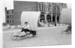 Boys racing on the promenade by Andrew Pitcairn-Knowles