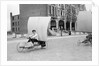 Boys racing on the promenade by Andrew Pitcairn-Knowles