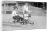 Hand Propelled Four Wheel Tandem on the Seafront by Andrew Pitcairn-Knowles