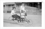 Hand Propelled Four Wheel Tandem on the Seafront by Andrew Pitcairn-Knowles