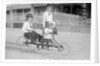 Hand Propelled Four Wheel Tandem on the Seafront by Andrew Pitcairn-Knowles