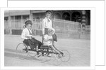Hand Propelled Four Wheel Tandem on the Seafront by Andrew Pitcairn-Knowles