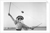 Well Caught, Woman Stretching Up by Andrew Pitcairn-Knowles