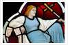 Reclining female bearing a cross by Stuart Cox