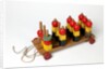Pull along to educational toy by Lines Bros Ltd