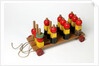 Pull along to educational toy by Lines Bros Ltd
