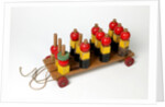 Pull along to educational toy by Lines Bros Ltd