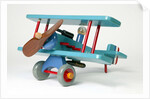 Toy aeroplane with detachable magnetic bomb by Dik Garrood