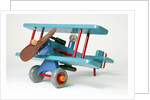 Toy aeroplane with detachable magnetic bomb by Dik Garrood