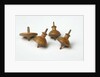 Miniature spinning tops by Unknown