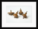 Miniature spinning tops by Unknown
