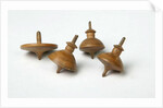 Miniature spinning tops by Unknown