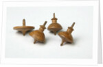 Miniature spinning tops by Unknown