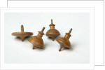 Miniature spinning tops by Unknown