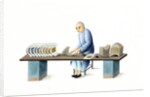 Man making paper ingots by Unknown