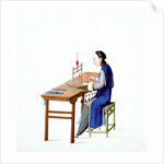 Woman plaiting threads by Unknown