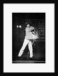 Paul Robinson in Betty Comden and Adolph Green's SinginÆ in the Rain at the National Theatre by Graham Brandon