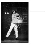 Paul Robinson in Betty Comden and Adolph Green's SinginÆ in the Rain at the National Theatre by Graham Brandon