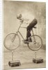 Trick Cyclist Balancing on Candles by Anonymous