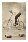 Trick Cyclist Balancing on Candles by Anonymous